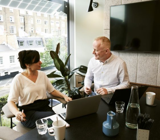 man-and-woman-discussing-and-sharing-ideas-2977565